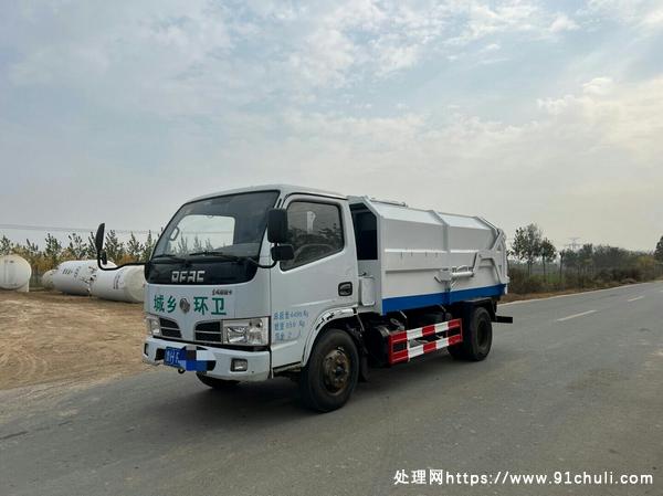 

蓝牌国五东风福瑞卡挂桶垃圾车，1.5万公里